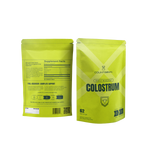 Two green packages of Countdown Colostrum on a white background