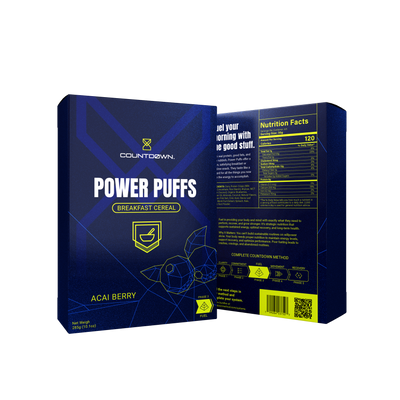 Box of Countdown Power Puffs Acai Berry breakfast cereal with blue and yellow design.